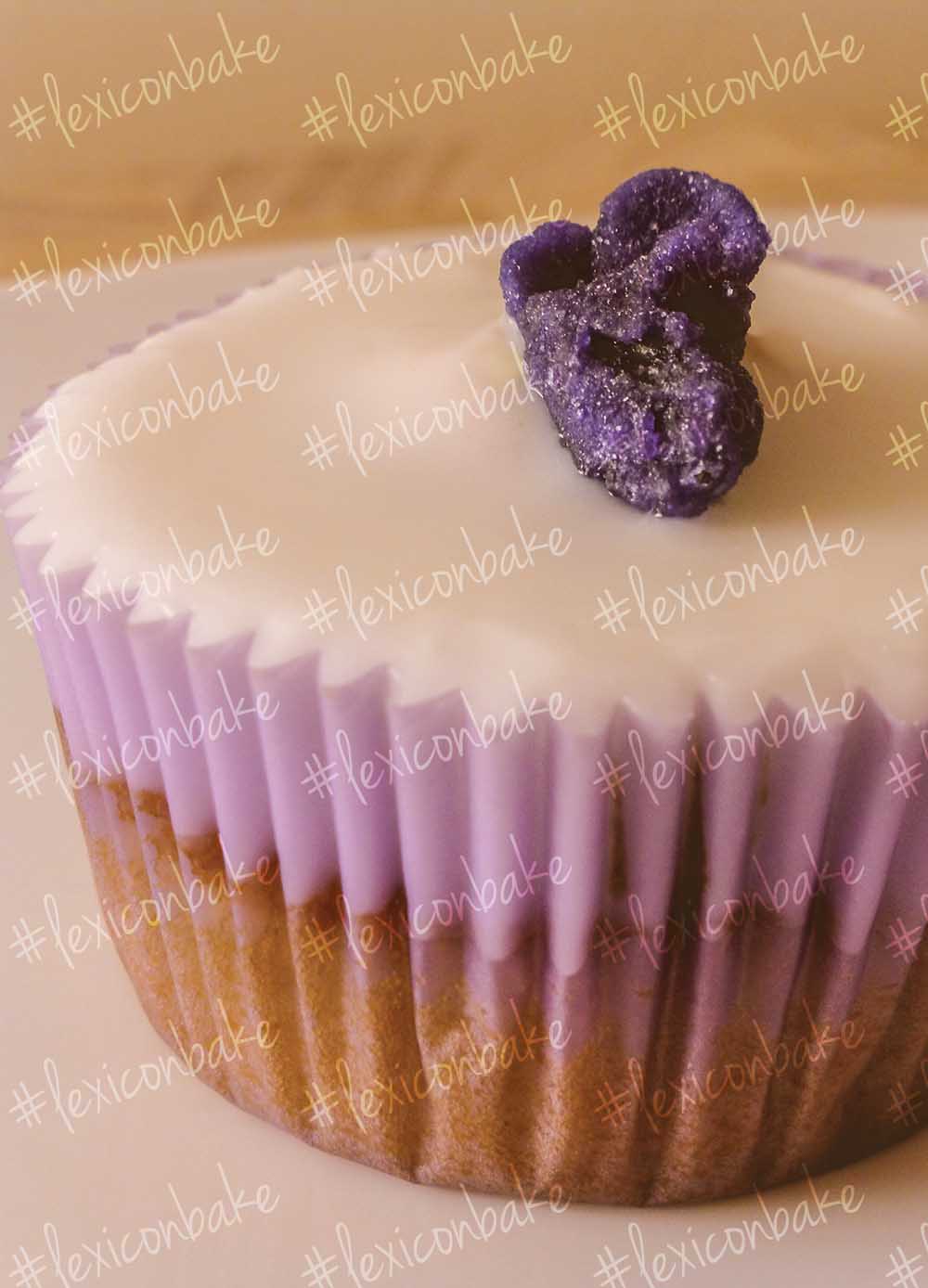 Cupcake with purple violet flower